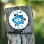 cycle route sign on a wooden post